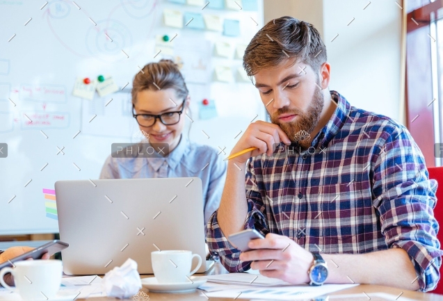 demo-attachment-127-people-working-in-office-P3DBYE3